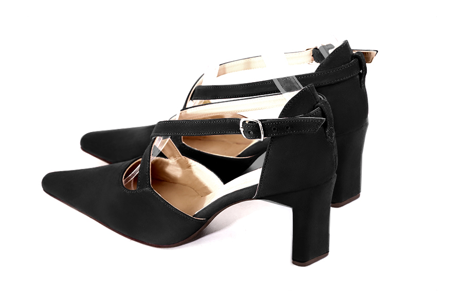 Women's matt black open side dress shoes, with crossed straps. Tapered toe. High comma heels - Rear view